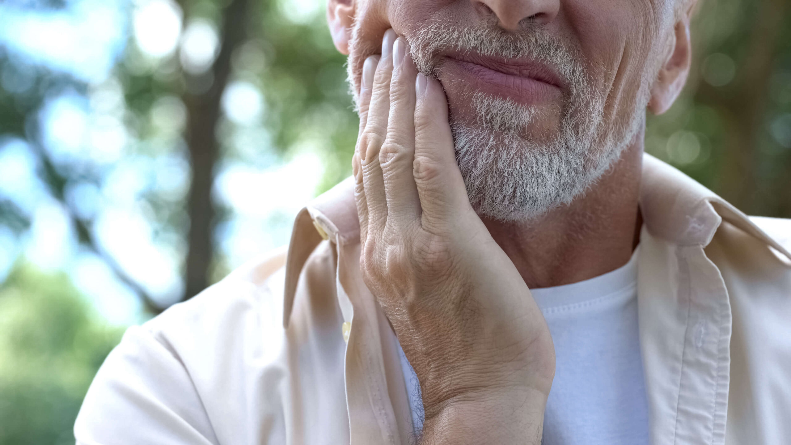 Man with gum disease in pain