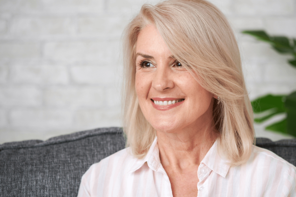 Woman with dental implants in Lion Dental, Stourbridge