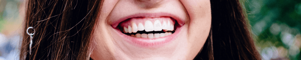 Woman with invisible braces in stourbridge smiling