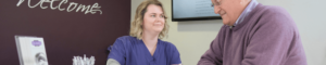 staff with patient at lion dental