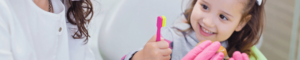 dentist showing child how to brush teeth in stourbridge
