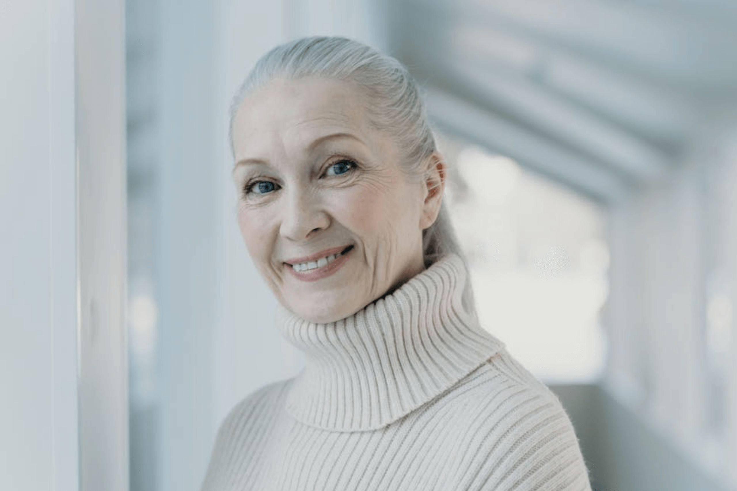 woman with dental implants smiling